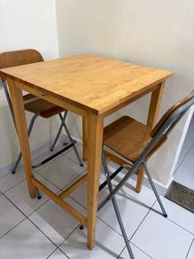 Wooden Table with Two Folding Chairs