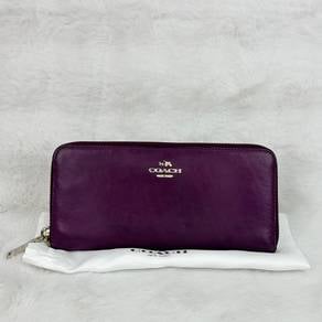 Authentic Coach long zip-around wallet in purple