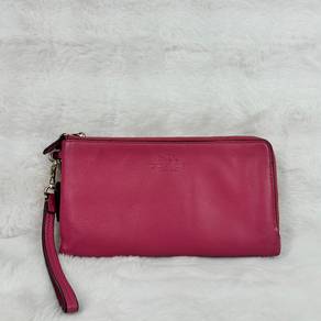 Coach pebbled leather clutch wrislet
