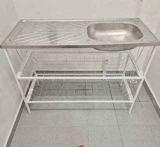 Kitchen sink with metal stand