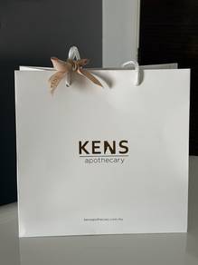 Kens apothecary paper bag with ribbon