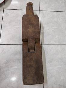 old wooden coconut grater