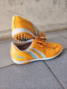vibrant orange Pan Bravo Agilis turf soccer shoes