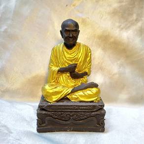 Archan Toh bucha with gold foil blessing