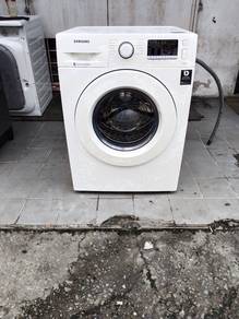Samsung front load hot washer washing machine 7.k
