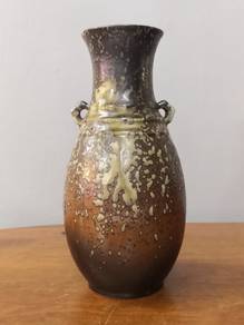 pottery vase with holders
