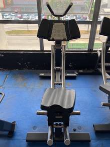 Abdominal Glide / Abdominal Crunch machine.