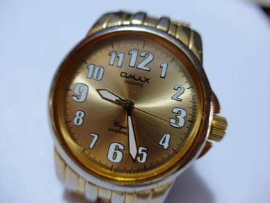 Omax Quartz Gold Watch
