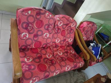Two-seater Wooden sofa frame with red patterned cu