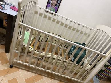 Wooden adjustable baby cot