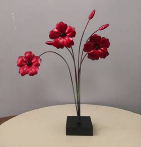 Red metal floral decor