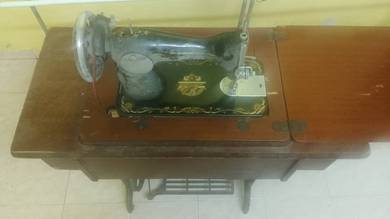 Mesin jahit Singer manual