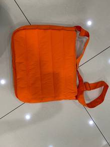 Orange colour sling bag