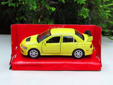 Welly (11cm) Mitsubishi Lancer Evo VIII Yellow Car