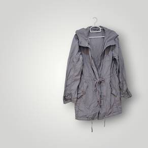 Grey hooded jacket with drawstring.