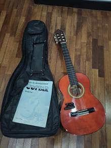 Kid Learning Guitar for Sale