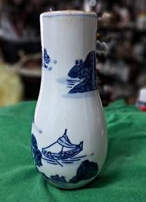 Vintage blue and white porcelain vase
- Features a