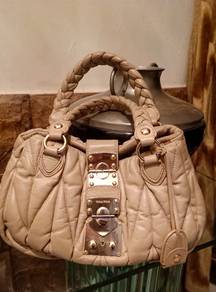 Preloved Miu Miu 