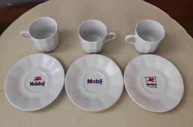 Mobil celebrates 100 years in Singapore cup saucer