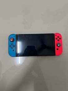 Nintendo Switch OLED Bundle + 2 Games