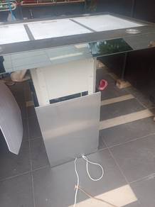 unused Electrolux kitchen hood and induction cooke