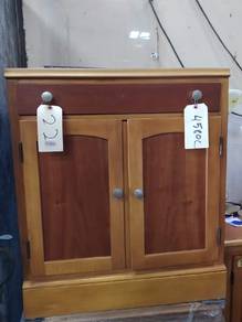 small two-door wooden cabinet or printer/storage