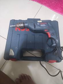 Drill Bosch  with hammer drill @