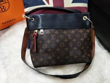 Louis Vuitton Sling Handbag