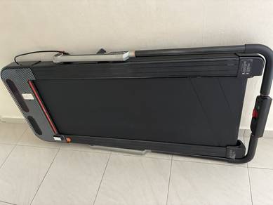 Treadmill with handle
