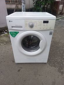 LG front load hot washer washing machine 7k.g