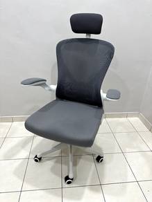 Ergonomic chair with backrest headrest