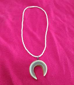 Love the shape!  pendant is horseshoe shaped