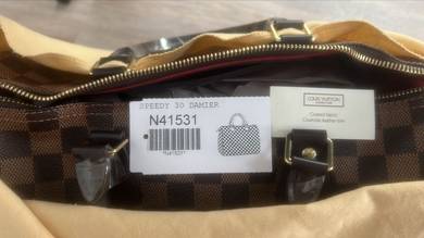 Louise Vuitton Brand New