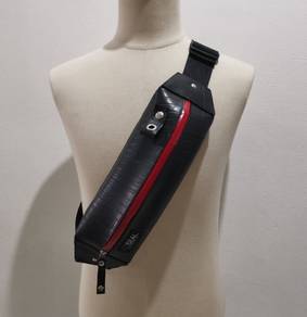 - SEAL sling bag, made in Japan
- Black exterior w