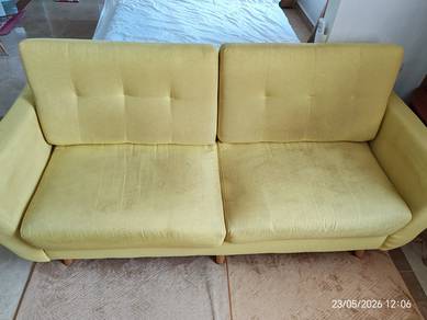 Yellow sofa with soft fabric
