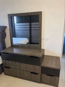 mirrored wardrobe and a small console