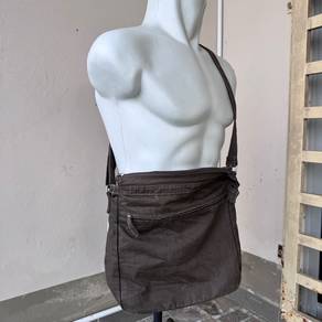 dark brown canvas sling messenger bag