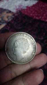 Duit syiling perak 2 1/2 Gulden Belanda yang memap