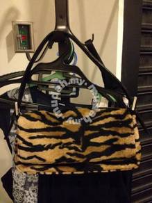 Tiger print faux fur bag with black strap