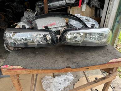 No 20-11-6 Skyline R34 BNR34 Xenon Headlamp Jpn