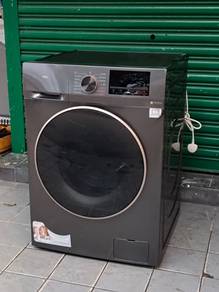 TCL 2IN1 front load hot washer with dryer 10/6 k.g