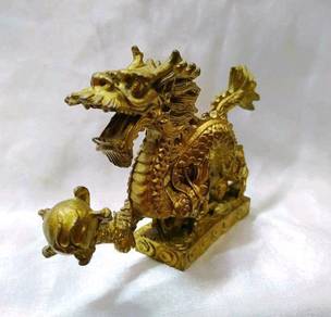 Antique brass feng shui dragon grasping pearl of s
