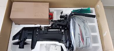 inflatable boat and Tohatsu 18 HP Engine 