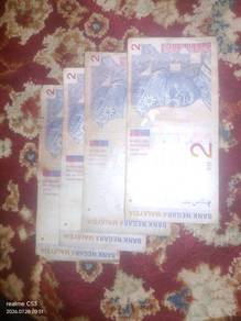 Old RM1 coins, first series and RM2 coins, first s