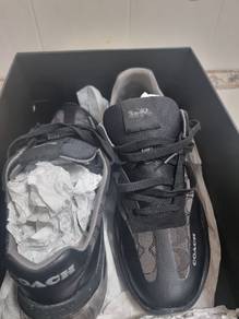USED SOLD AS IS 
coach city sole SIG RNNR black sh