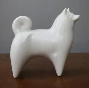 Ceramic white dog figurine