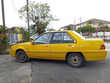 Proton Iswara in Kuching, SWK