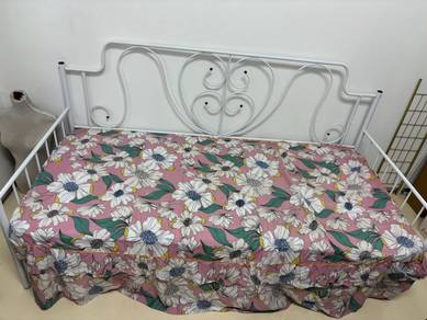 White Metal Daybed with Floral Mattress and Skirt