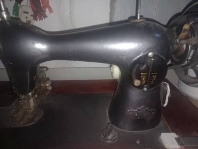 Mesin Jahit Lubang Butang