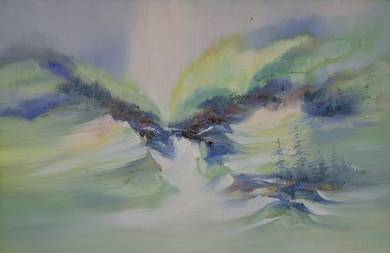 Serene Waterfall Flowing Through Misty Hills